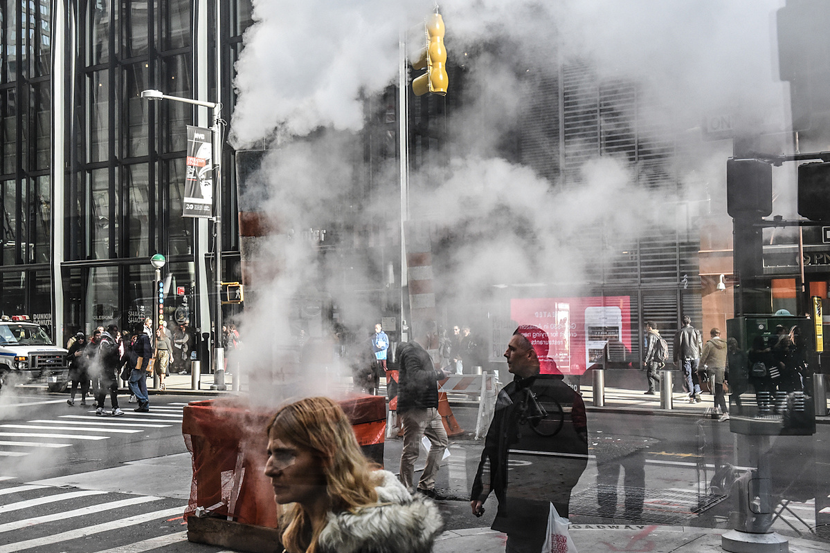 NEW YORK, NY - Steam rises out of a street vent in front of the Fulton St. subway station in lower Manhattan on November 15, 2017 in NY. NY. (Photo by Stephanie Keith)